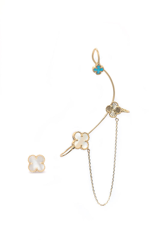 Arete 14 kilates con tres flores de cuatro pétalos decrecientes, madre perla, diamantado y esmaltado azul.