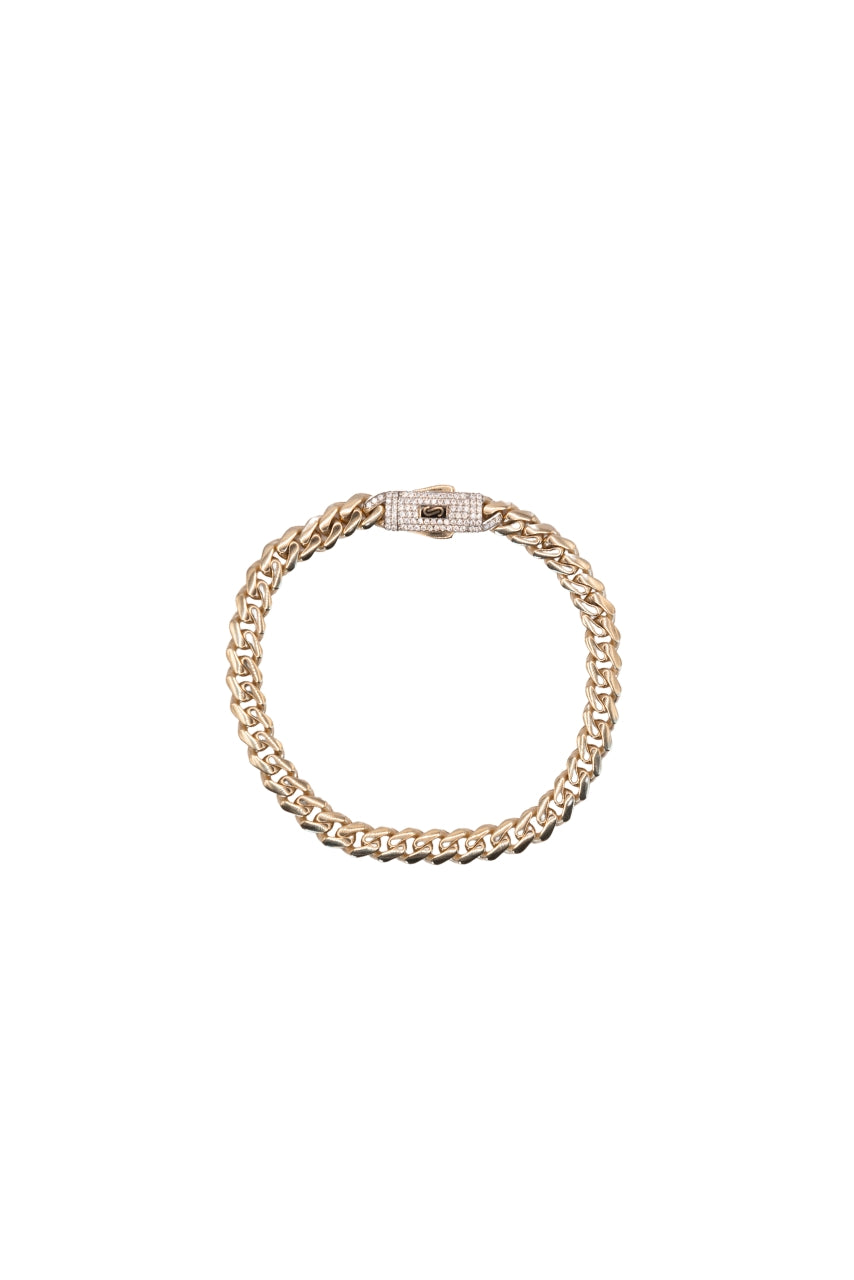 Pulsera 14 kilates con eslabón barbado liso y broche zirconias.