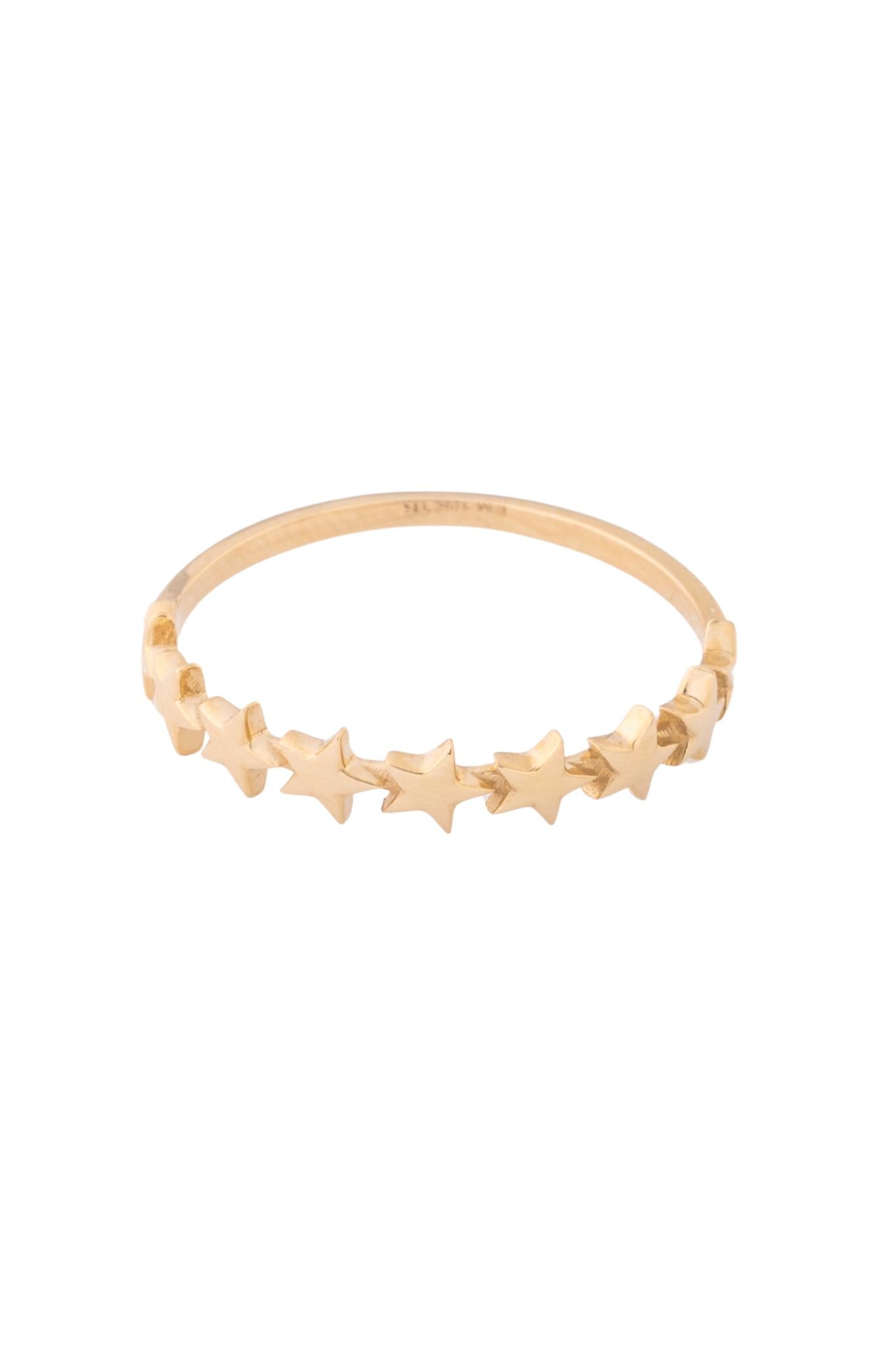 Anillo de oro solido en 10 kilates con estrellas lisas pequeñas en el centro .png