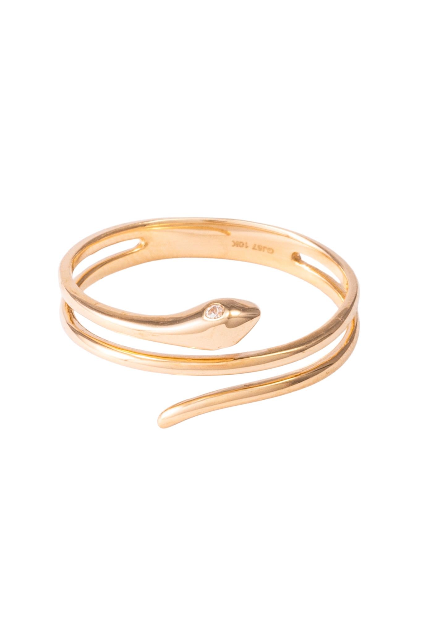 Anillo de oro solido en 10 kilates con forma de vibora lisa y los ojos de zirconia.png