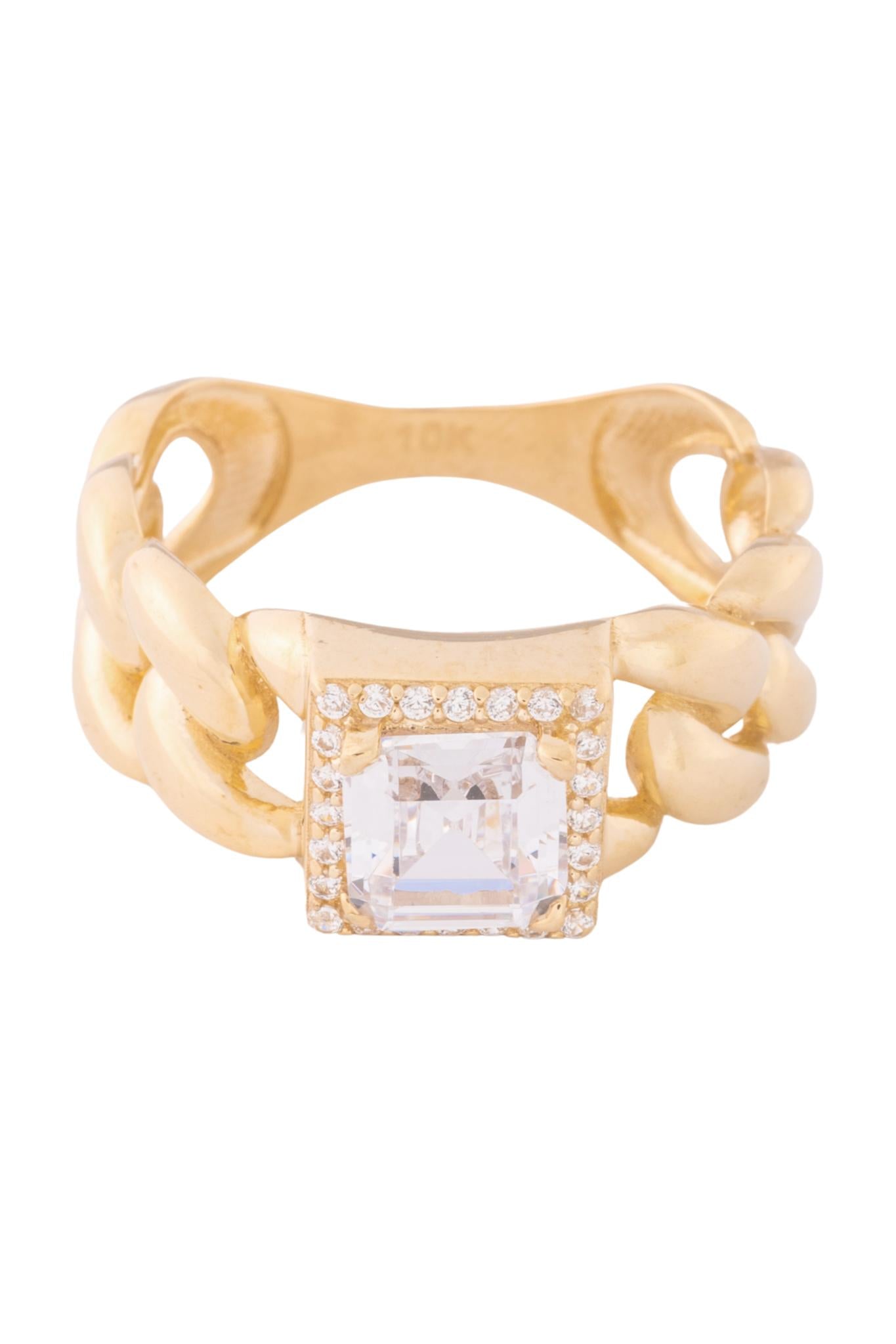 Anillo de oro solido en 10 kilates con un estilo cruzado y una piedra cuadrada en el centro .png