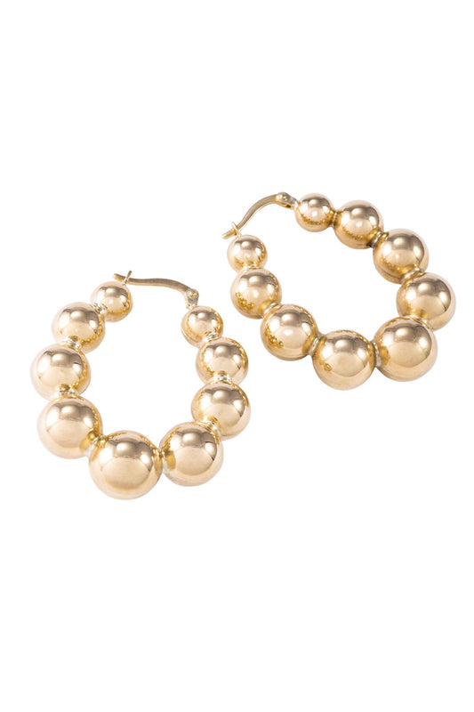 Arracada de oro solido en 10 kilates con estilo de bolas grandes .png