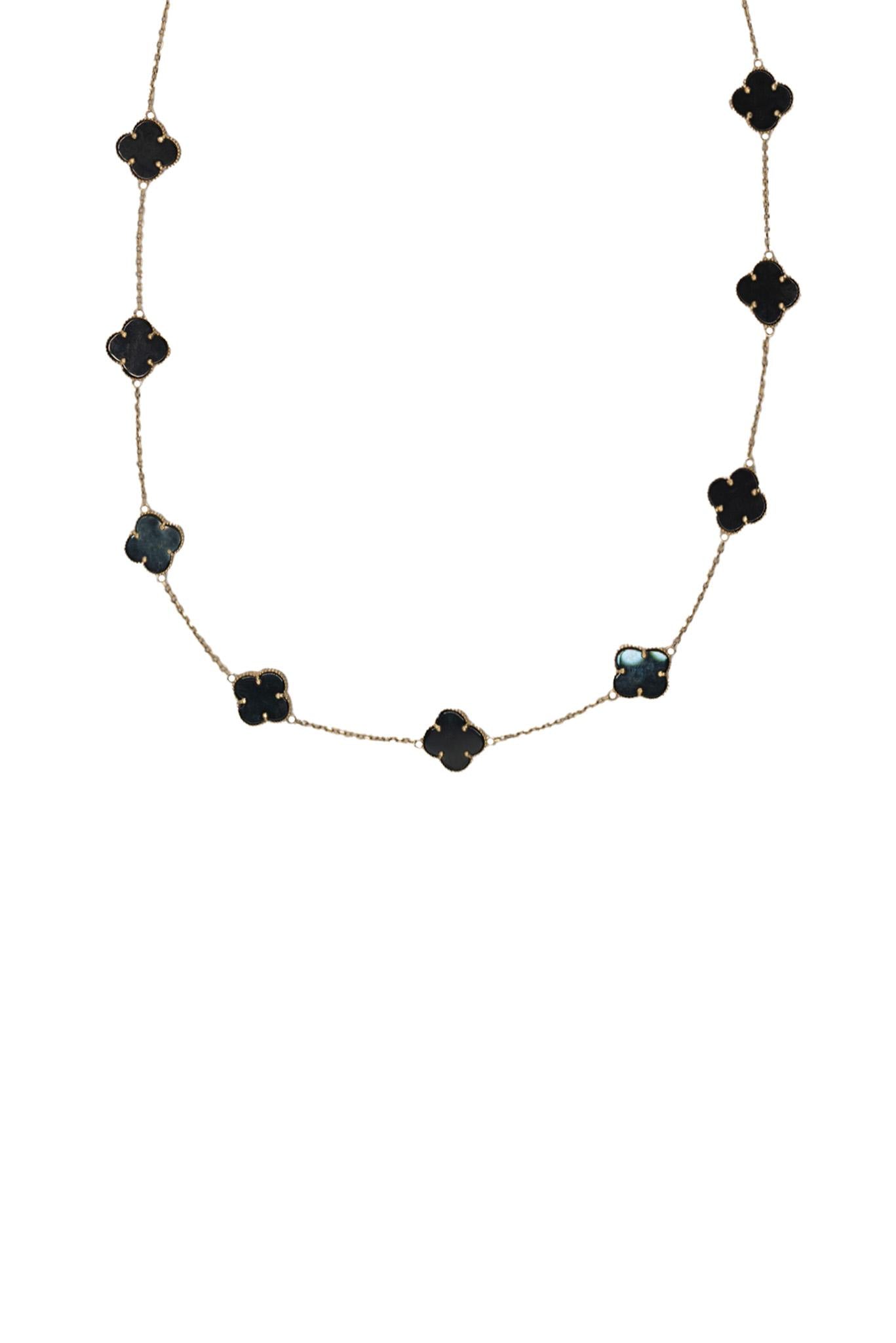Collar de oro solido de 10 kilates con flor de cuatro pétalos negro ónix.png
