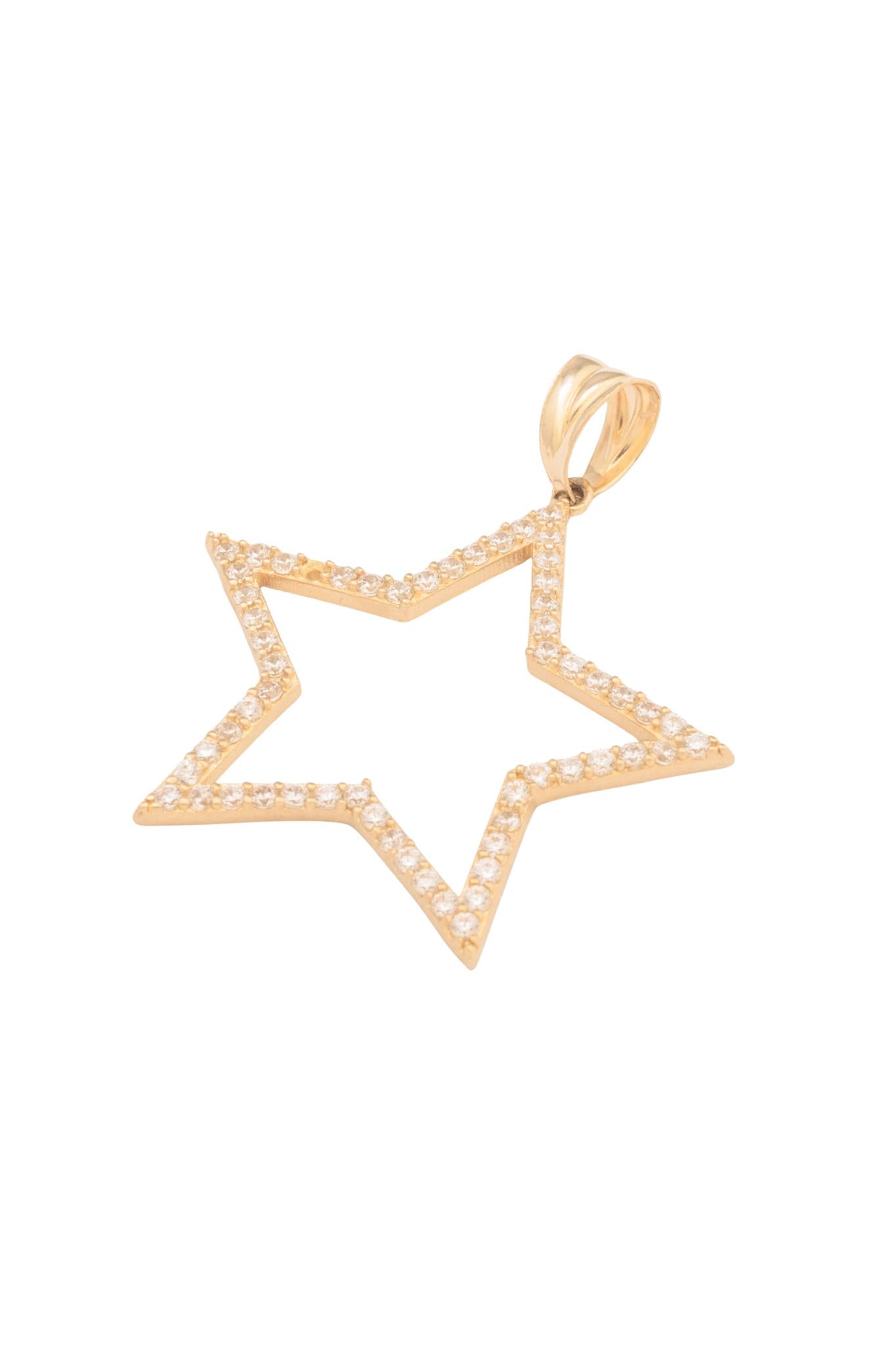Dije 10 kilates contorno de estrella hueca con zirconia.png