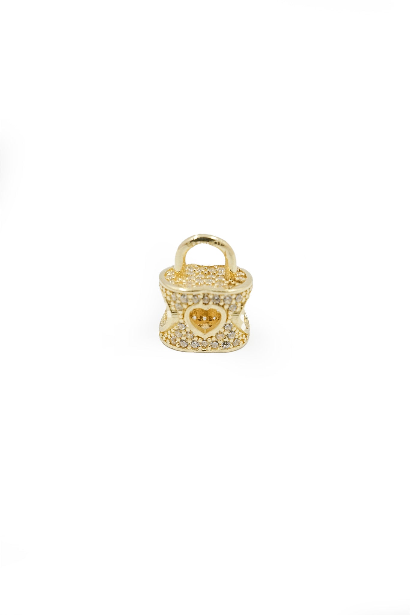Dije charm 14 kilates bolsa tupida zirconias y corazón hueco al centro..png