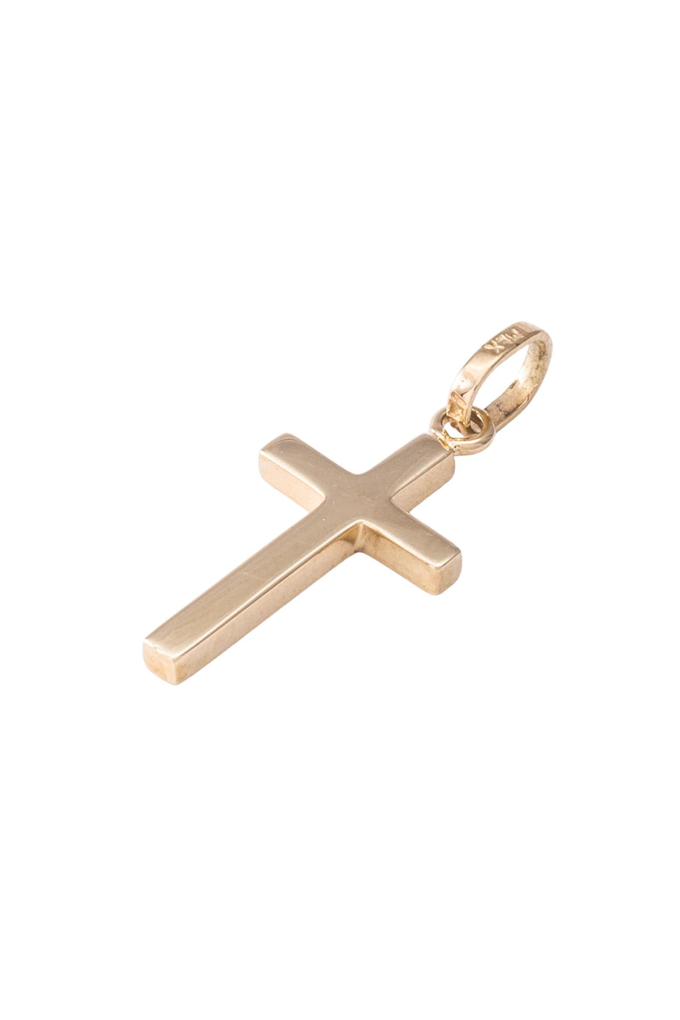 Dije de oro sólido en 14 kilates con forma de cruz 3D delgada lisa..png