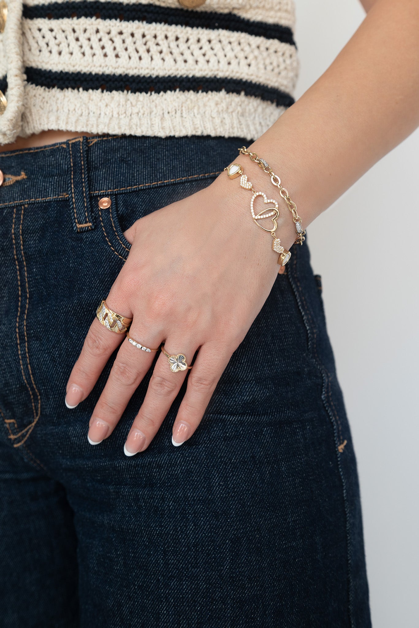 Pulsera 10 kilates eslabones circulares y oro blanco con zirconias.