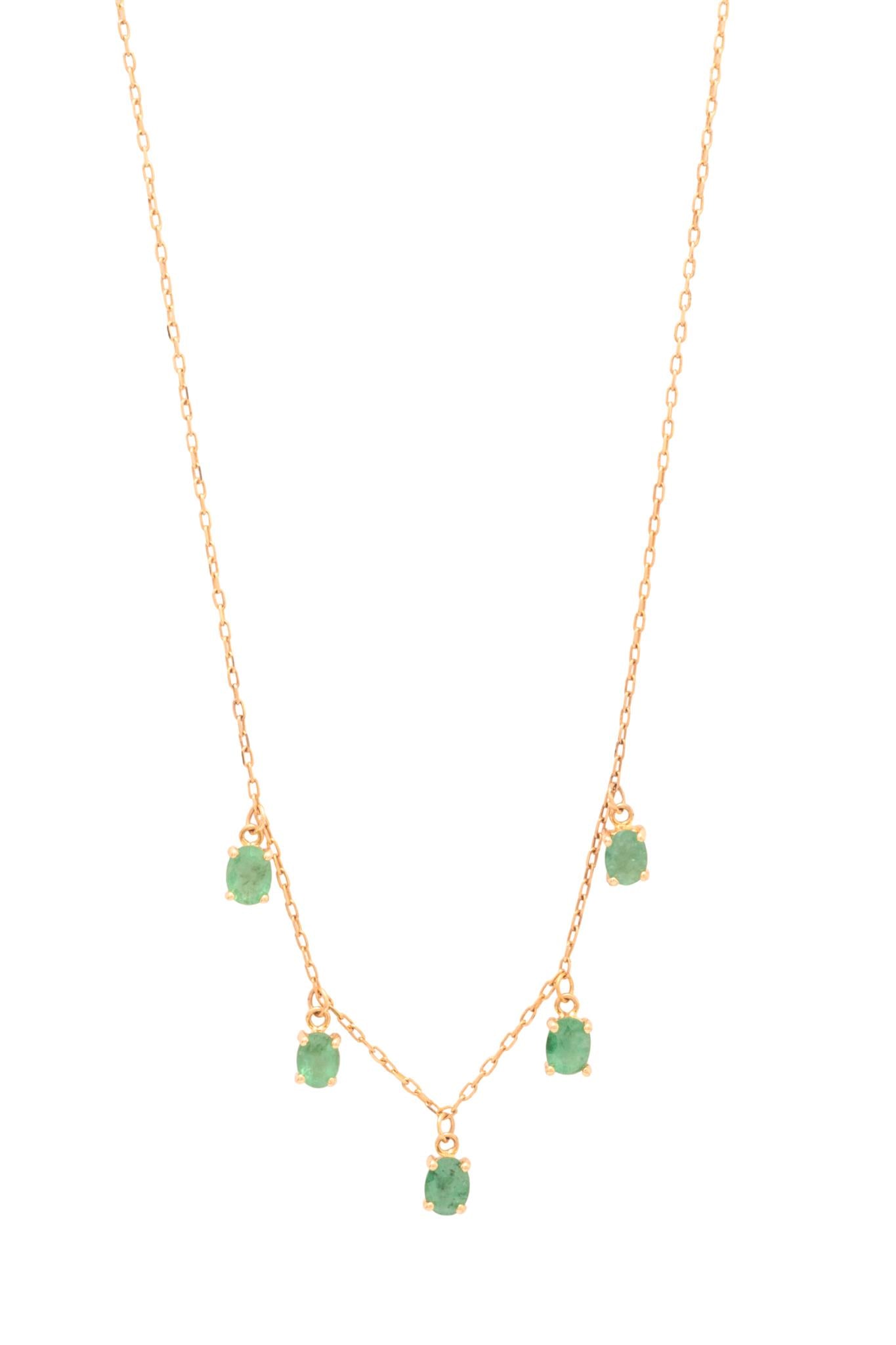 Gargantilla de oro sólido en 14 kilates con cinco esmeraldas colgantes ovales..png