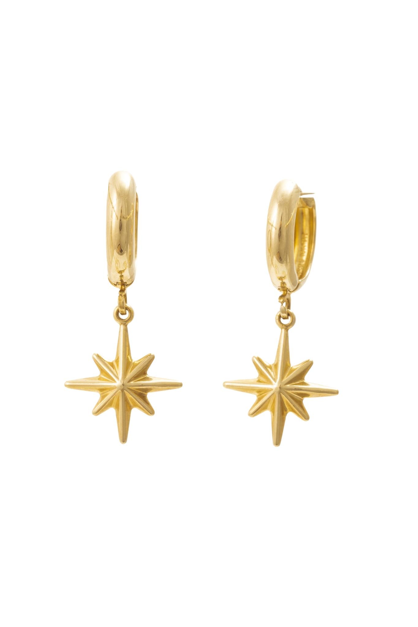 Huggie de oro solido de 10 kilates con una estrella de 8 picos.png