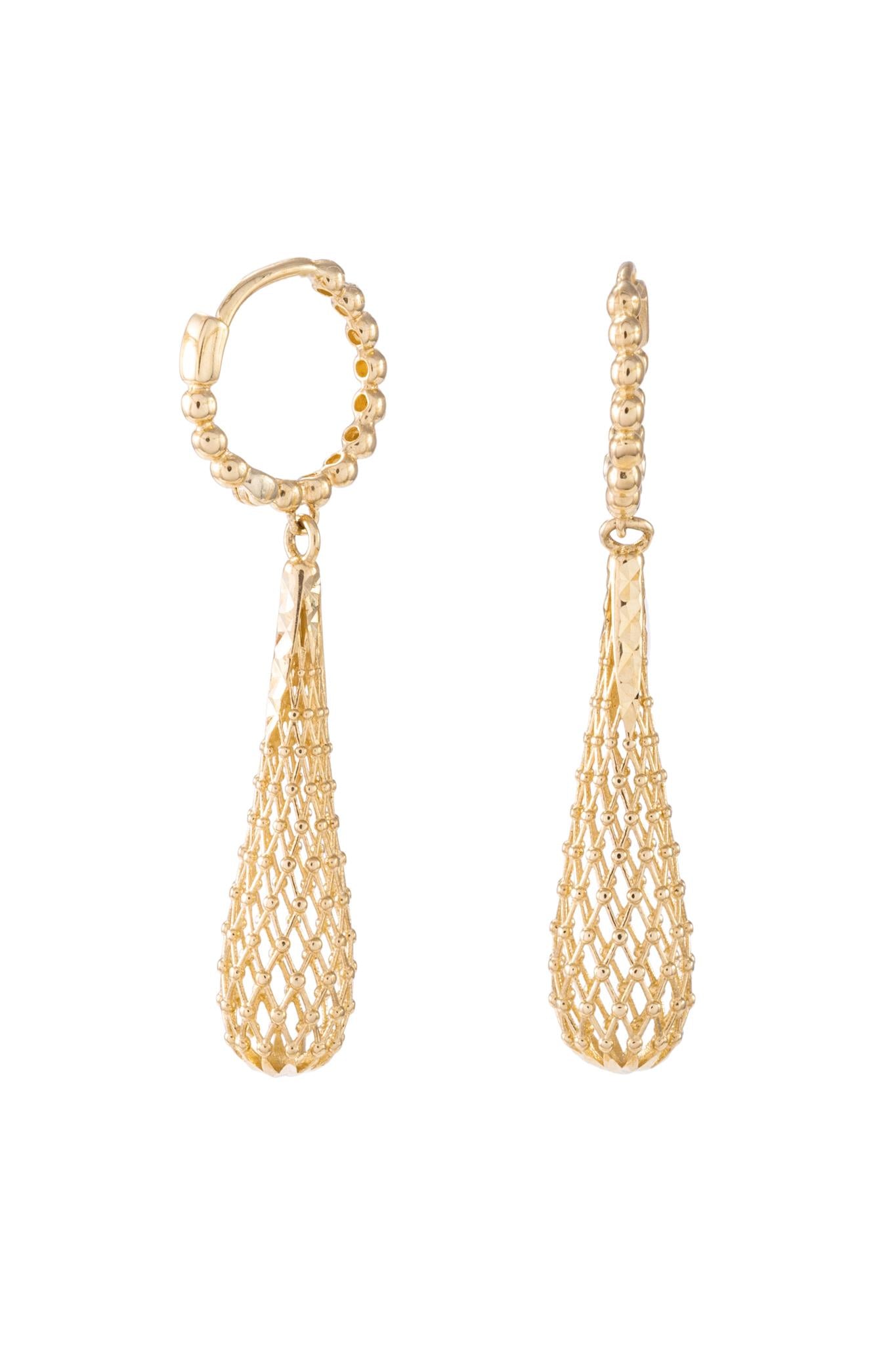 Huggie de oro solido en 10 kilates con bolitas .png