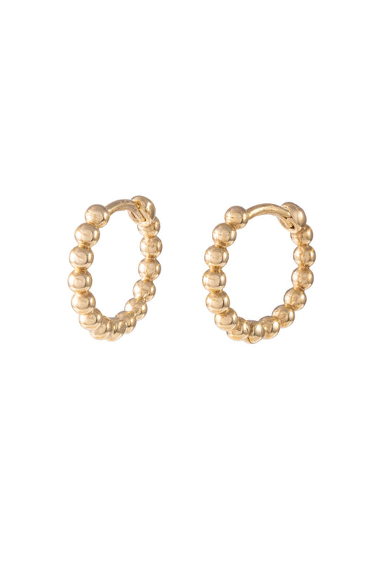 Huggie de oro sólido en 10 kilates con bolitas.png