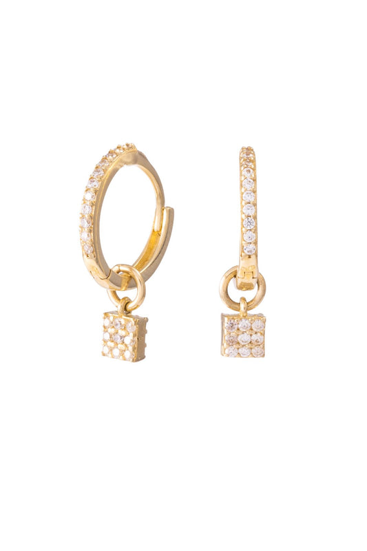 Huggie de oro sólido en 10 kilates con churumbela delgada .png