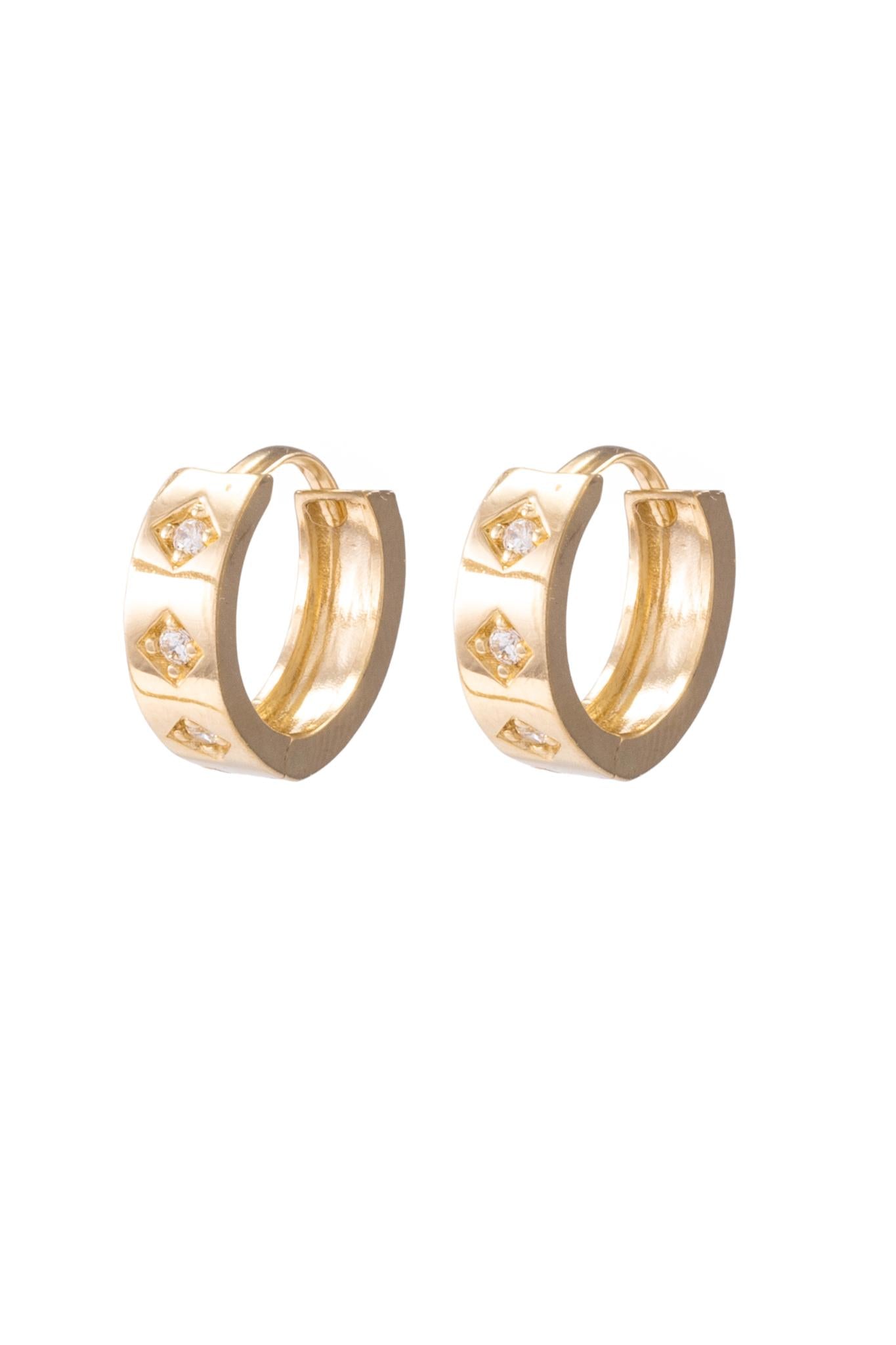 Huggie de oro sólido en 10 kilates con medida chica .png