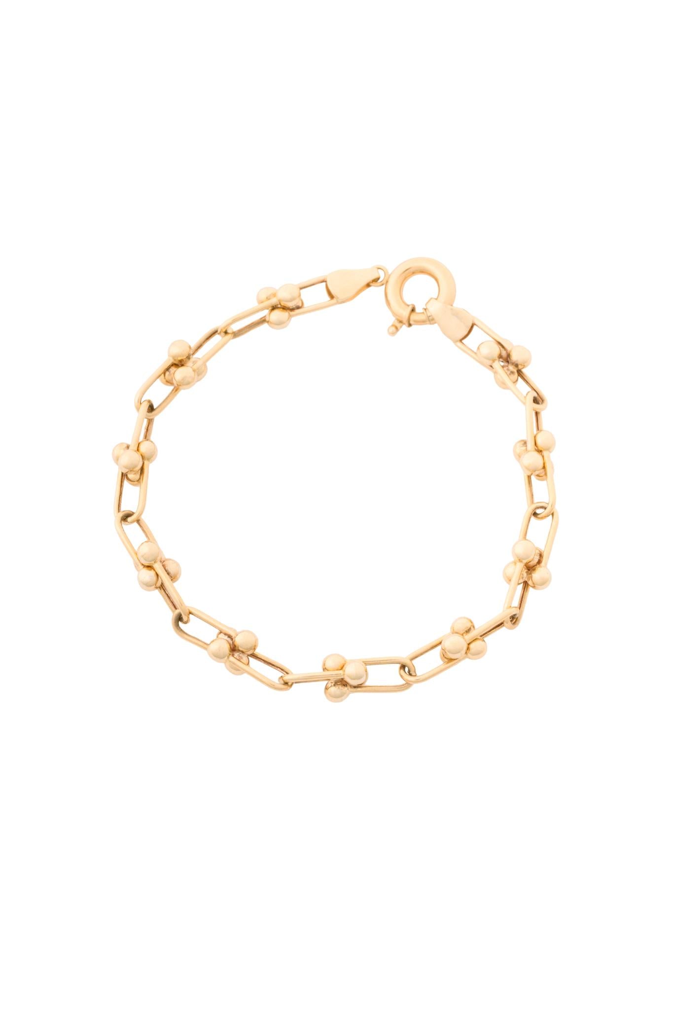 Pulsera 10 kilates eslabones alargados y bolitas lisas intercalados..png