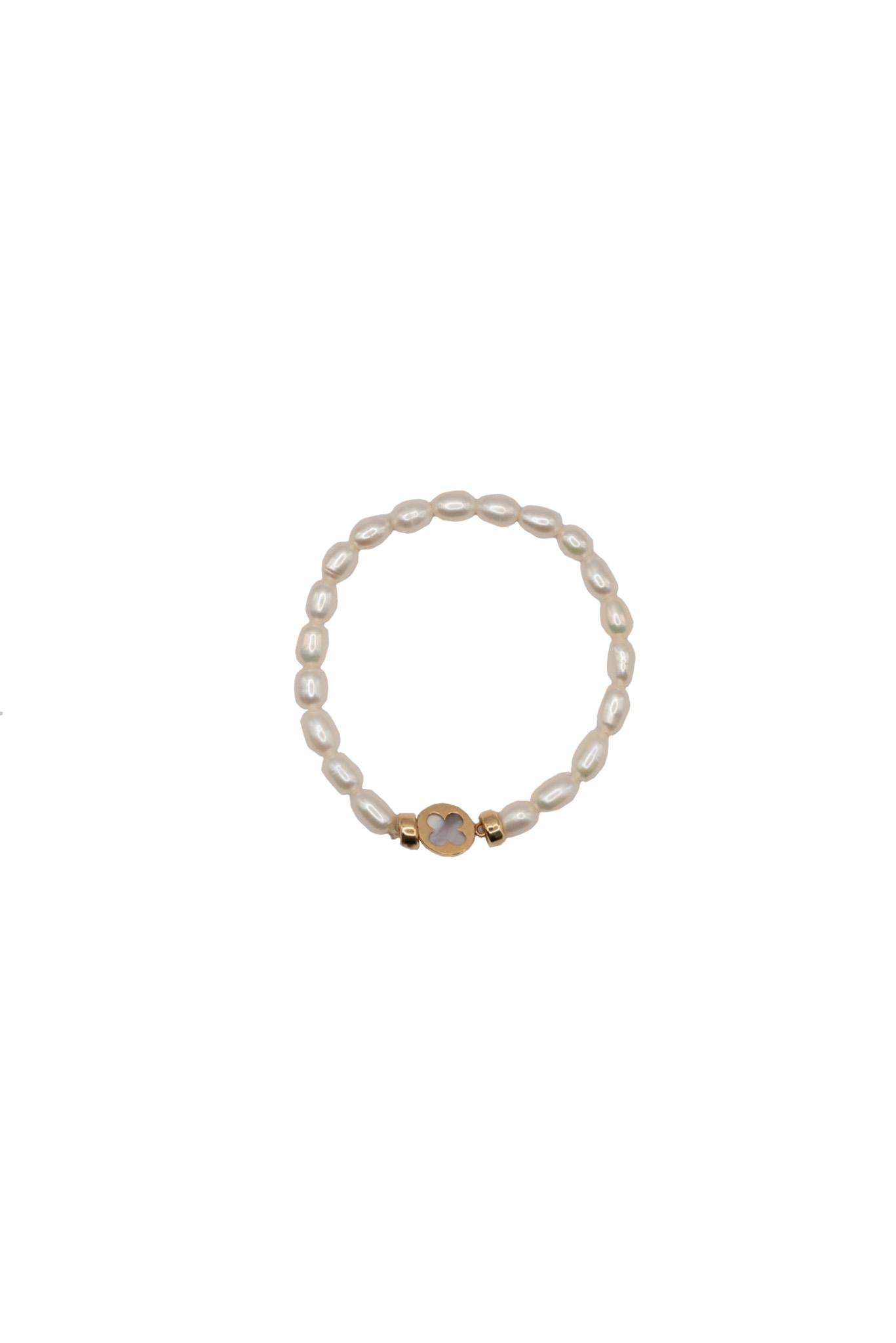 Pulsera de oro solido de 10 kilates con perlas y flor con madre perla.png