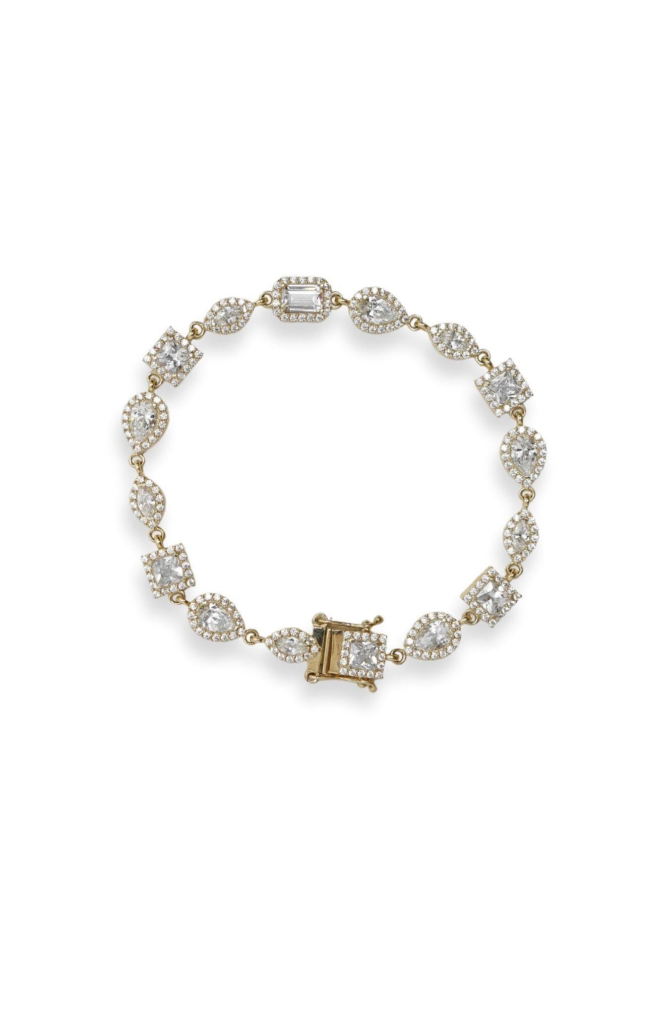 Pulsera de oro sólido en 10 kilates con dijes de zirconias cuadradas, en gota y ovaladas con contorno de zirconias minis.png