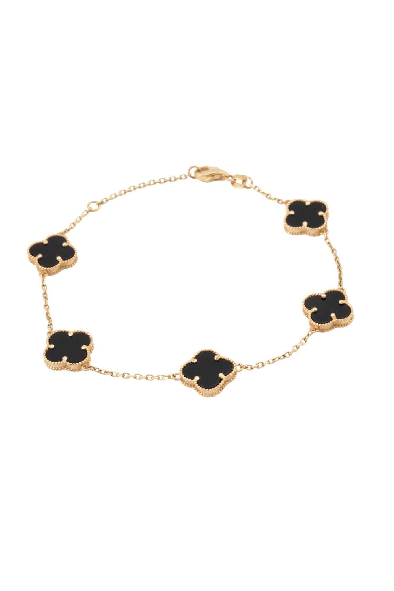 Pulsera de oro sólido en 10 kilates con flores de cuatro pétalos negros grande..png