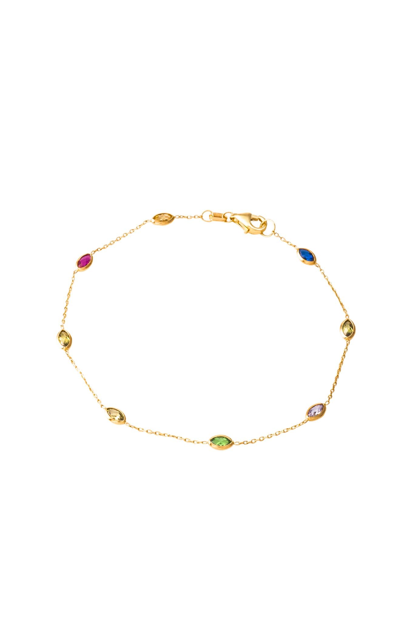 Pulsera de oro sólido en 10 kilates con forma de semilla zirconias de colores y bisel liso..png