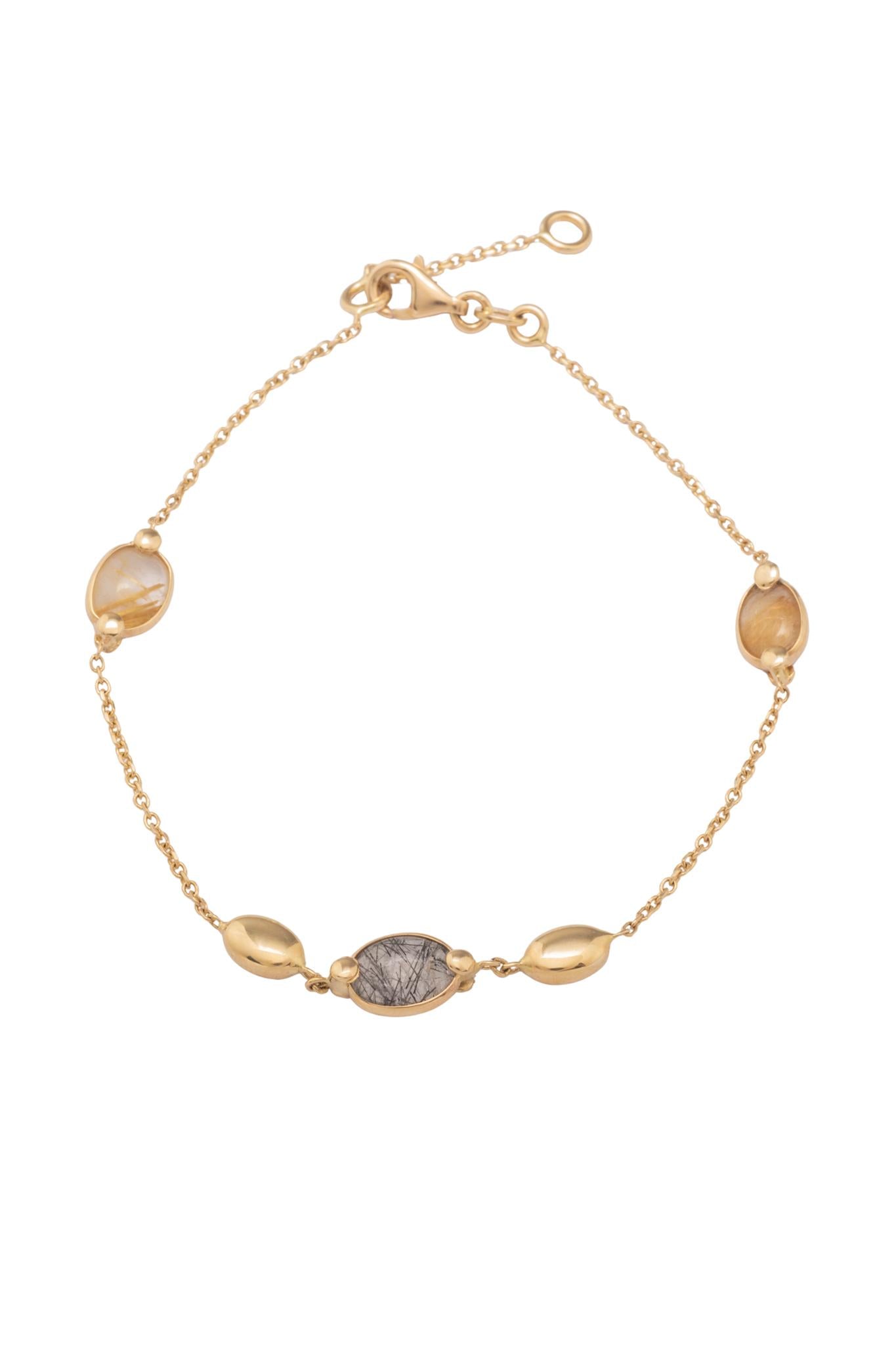 Pulso de oro sólido en 14 kilates con cuarzos rutilados amarillos, azules y semillas de oro amarillo lisos biselados..png