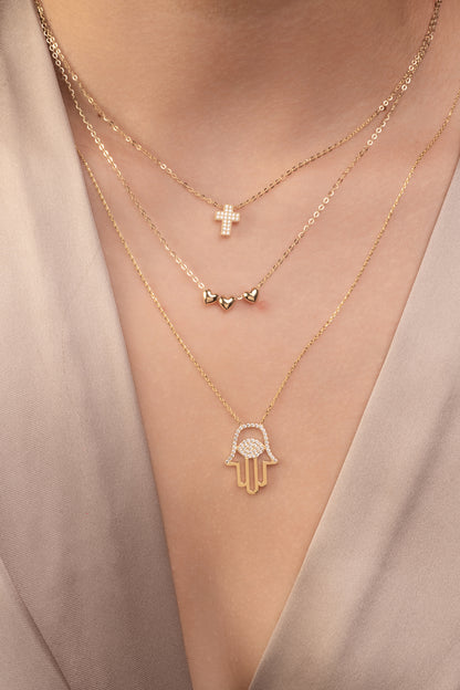 Gargantilla 10 kilates tres dijes de corazones inflados lisos oro amarillo