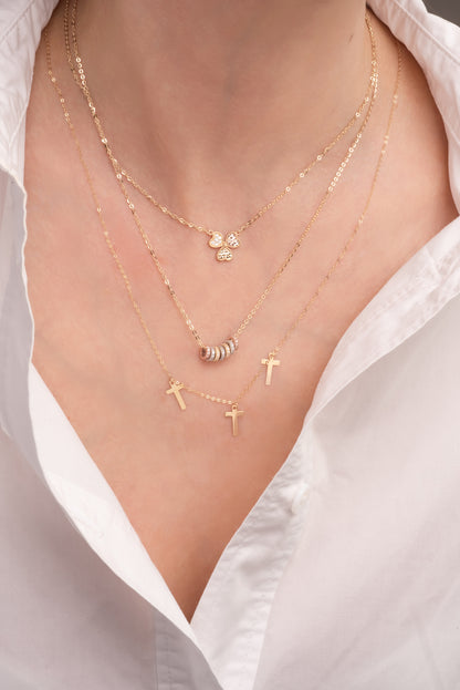 Gargantilla 10 kilates dije de trébol de tres hojas diamantado en oro florentino