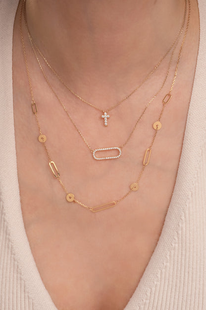 Gargantilla de oro sólido en 10 kilates con círculos y eslabones rectangulares ovalados.