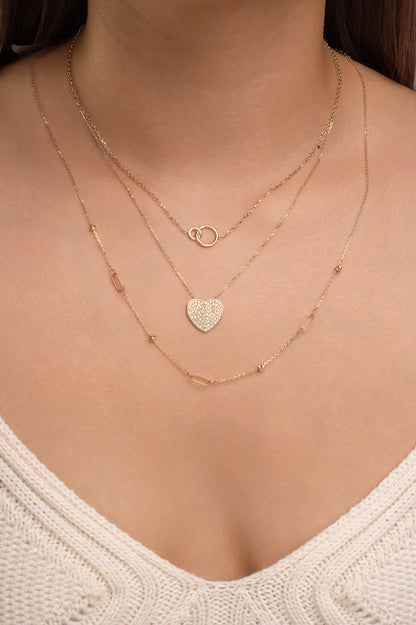 Gargantilla de oro sólido en 10 kilates con dos aros enlazados lisos chico y grande.