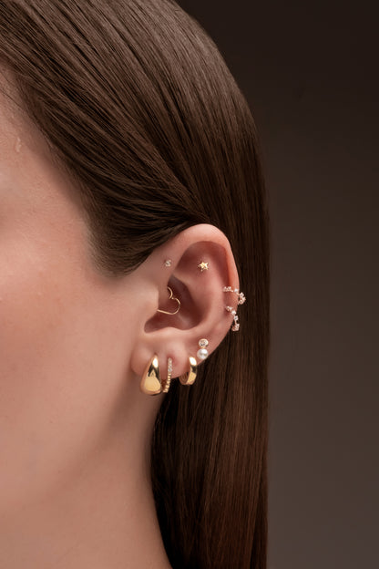 Huggie 10 kilates forma básica lisa gruesa