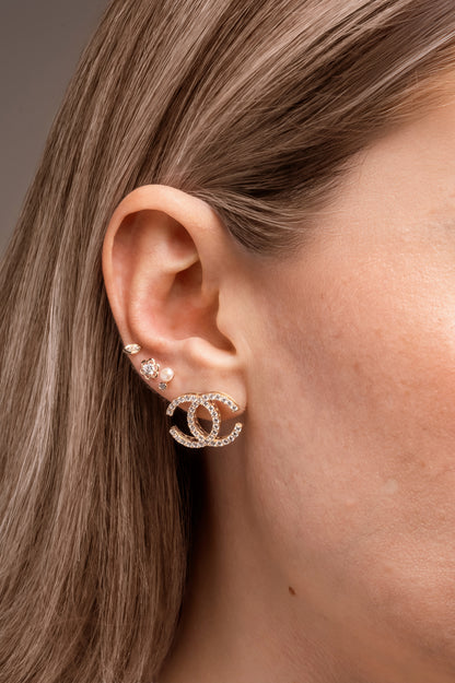 Arete 10 kilates doble C de zirconias grande