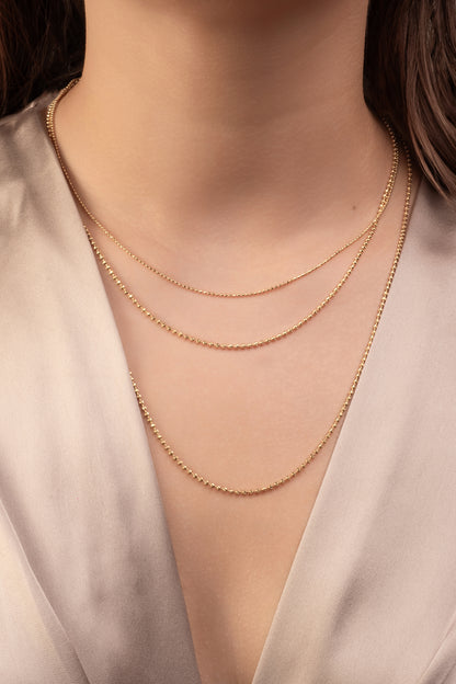 Cadena 10 kilates bolitas grandes diamantadas 45 cm