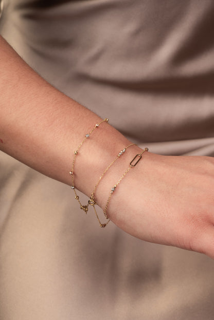 Pulsera 10 kilates bolitas de oro florentino chicas.