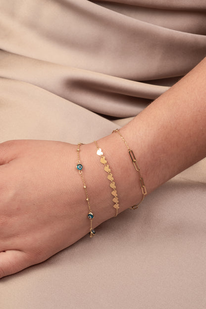 Pulsera 10 kilates cadena normal con eslabón abierto ovalado tres seguidas