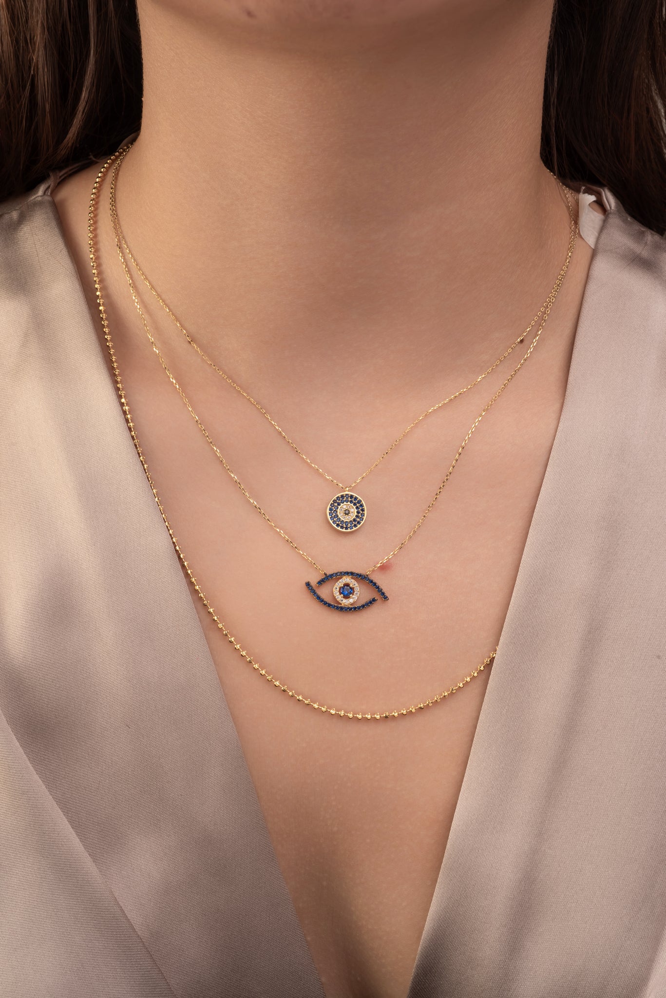 Gargantilla 10 kilates ojo de zirconias azules y blancas grande