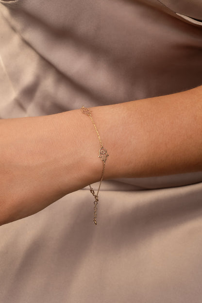 Pulsera 10 kilates tres siluetas de mano de fátima