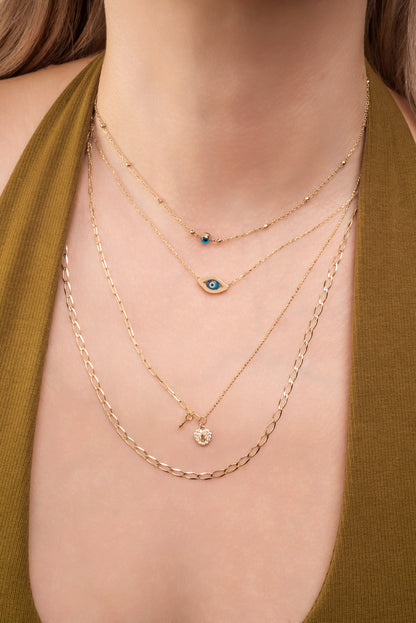 Gargantilla 10 kilates ojo turco con contorno de zirconias