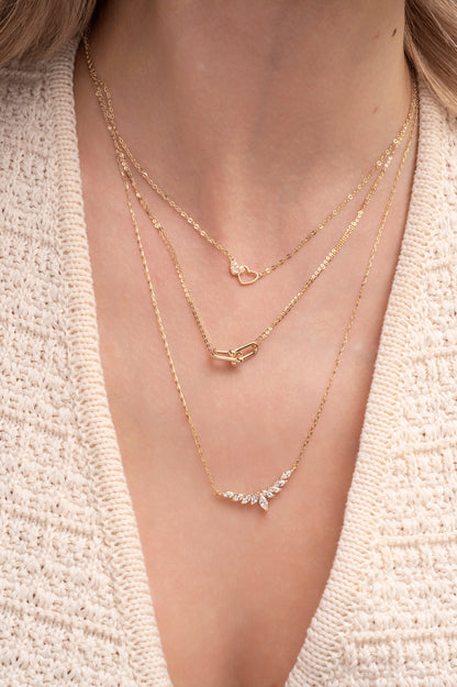 Gargantilla 10 kilates zirconias en forma de semillas y guirnalda