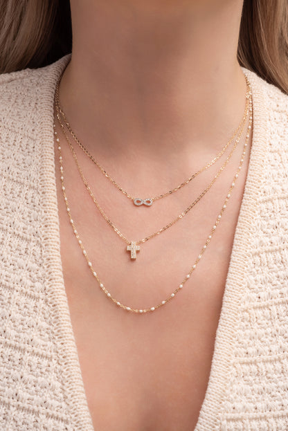 Gargantilla 10 kilates dije de infinito de zirconias y baño de oro blanco