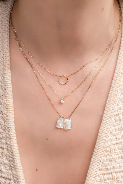 Gargantilla 10 kilates zirconia blanca y cuatro uñas