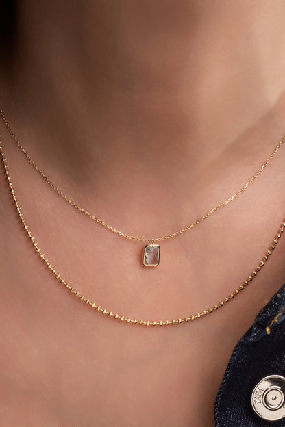 Gargantilla 10 kilates piedra lila y aretes piedra lila