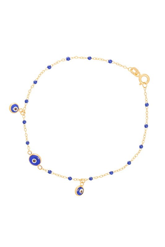 Pulsera 10 kilates bolitas esmaltadas azul rey y dijes ojos.