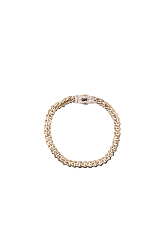 Pulsera 14 kilates con eslabón barbado liso y broche zirconias.