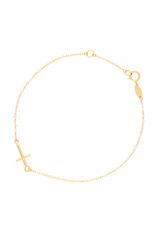 Pulsera 10 kilates bolitas esmaltadas blancas y cruz.