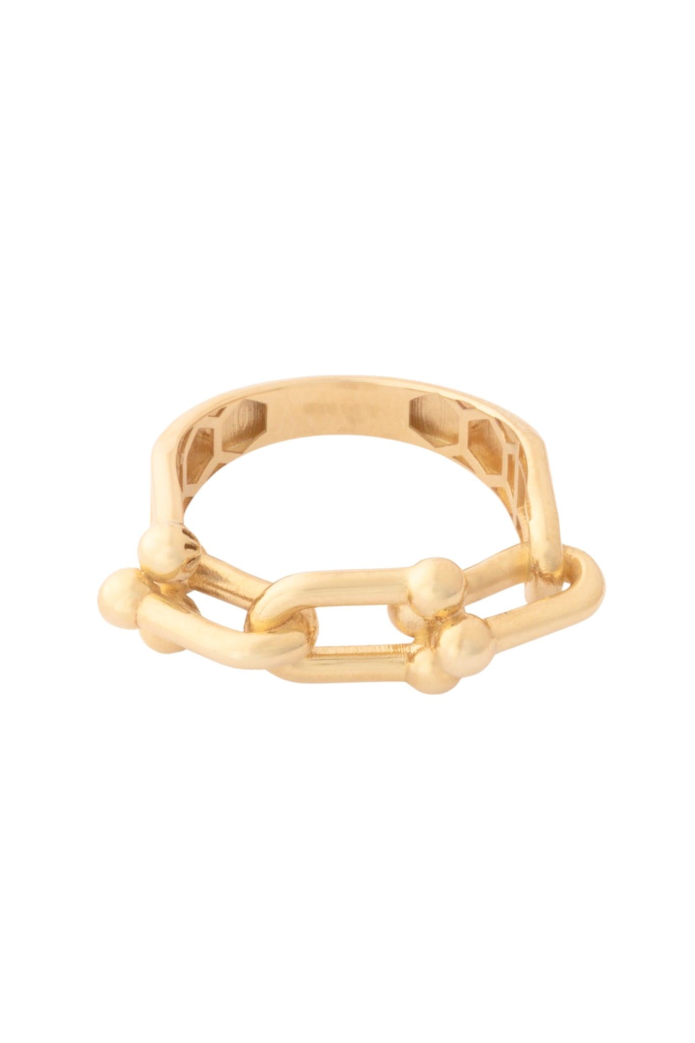 Anillo 10 kilates con forma de eslabones alargados y bolitas lisas al final..png