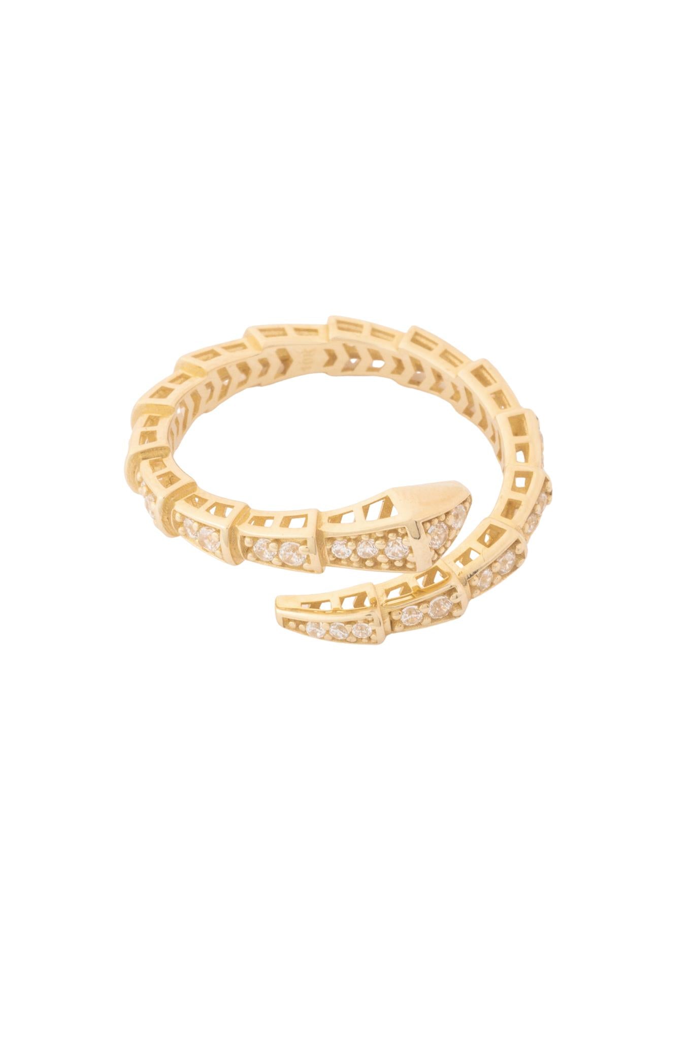Anillo 10 kilates con forma de serpiente tupida de zirconias blancas..png