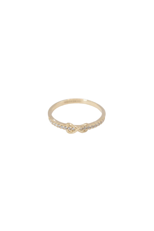 Anillo 10 kilates con media churumbela y centro infinito liso enlazado..png