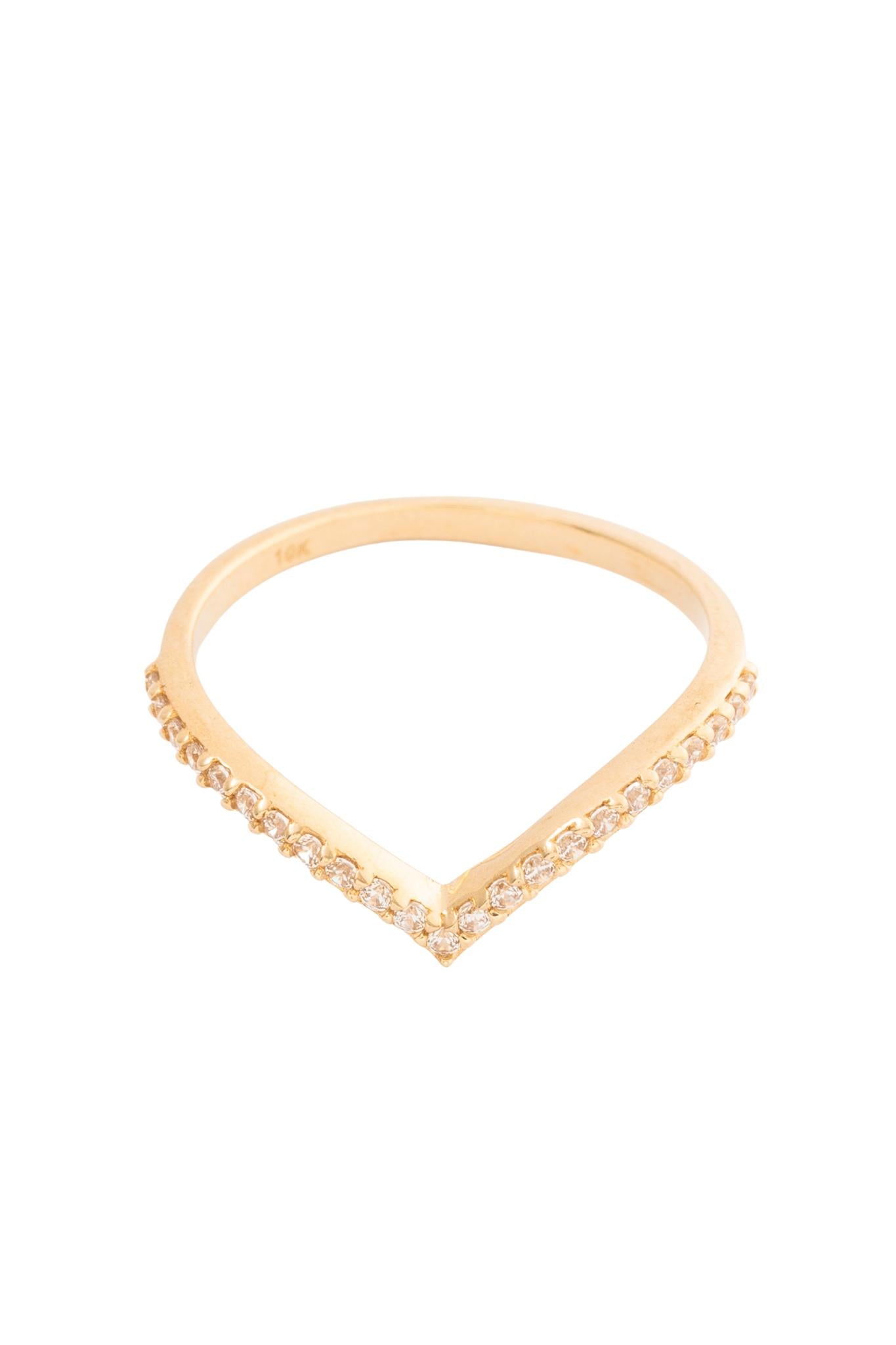 Anillo 10 kilates con pico en V de zirconias..png