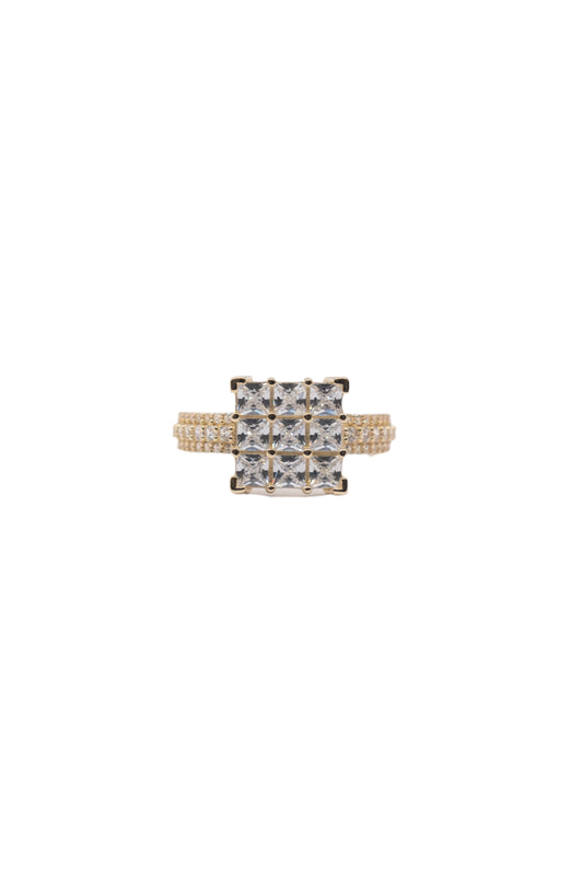 Anillo 10 kilates cuadro con zirconias cuadradas grandes y brazo churumbela triple..png