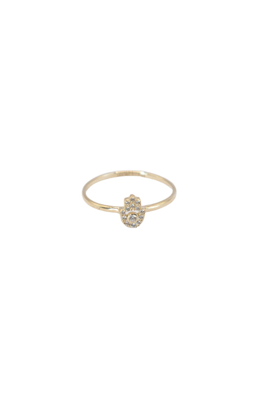 Anillo 10 kilates mano fátima al centro zirconias blancas..png