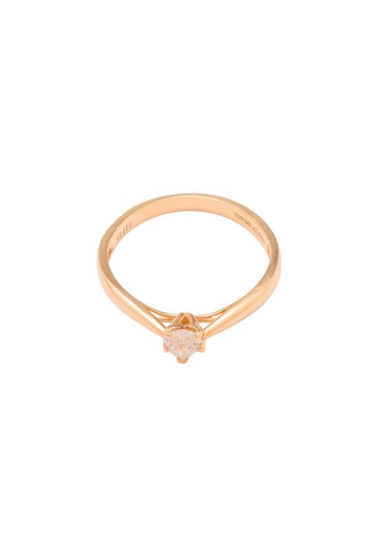 Anillo 10 kilates un brazo grueso y al final delgado, una zirconia en el centro de corazón..png