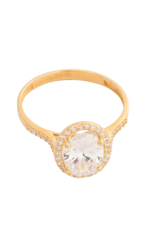 Anillo 10 kilates zirconia ovalada grande y contorno de zirconias minis..png